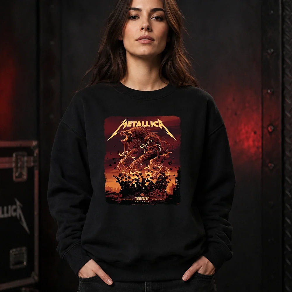 Metallica M72 World Tour April 26 2025 Rogers Centre Toronto Ontario Canada T-shirt by John Guydo featuring a roaring beast rising from shattered debris with flying rocks, fiery red-orange sky and Toronto event text.